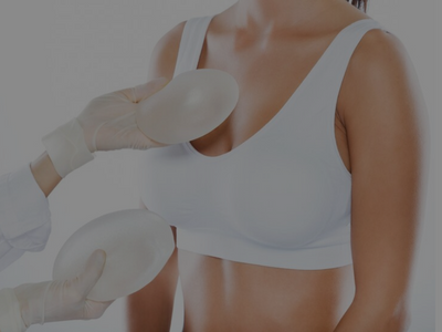 doctor is checking female patient for Breast augmentation